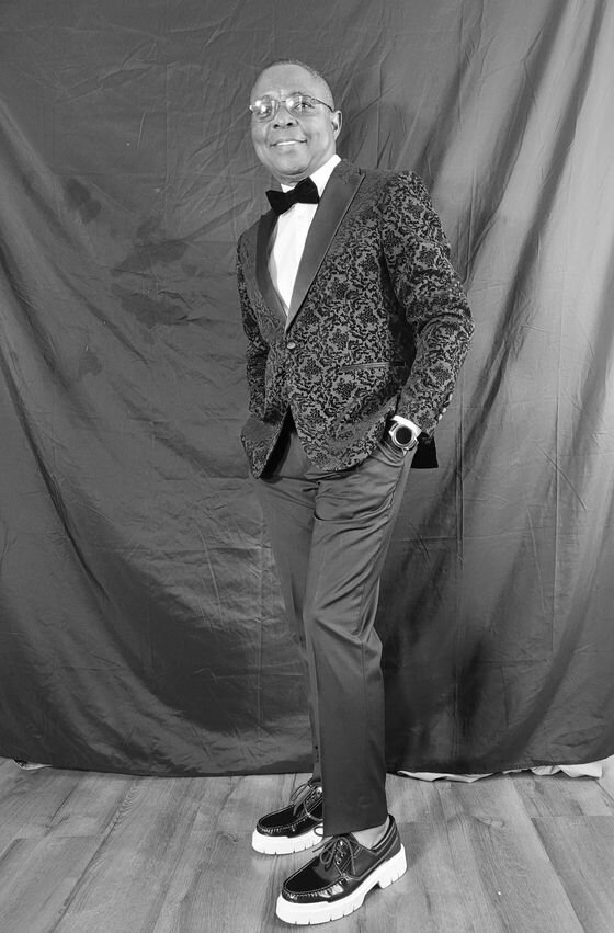 Full length portrait of Dr. Victor Eghujovbo